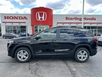 Command the road in this sleek 2018 GMC Terrain SLE, boasting a powerful 1.5L Turbo engine and a wea... (image 6)