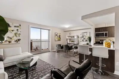 8885 Riverside Dr | Don't miss out on this two-bedroom plus den with water views! Now offering 1 mon...