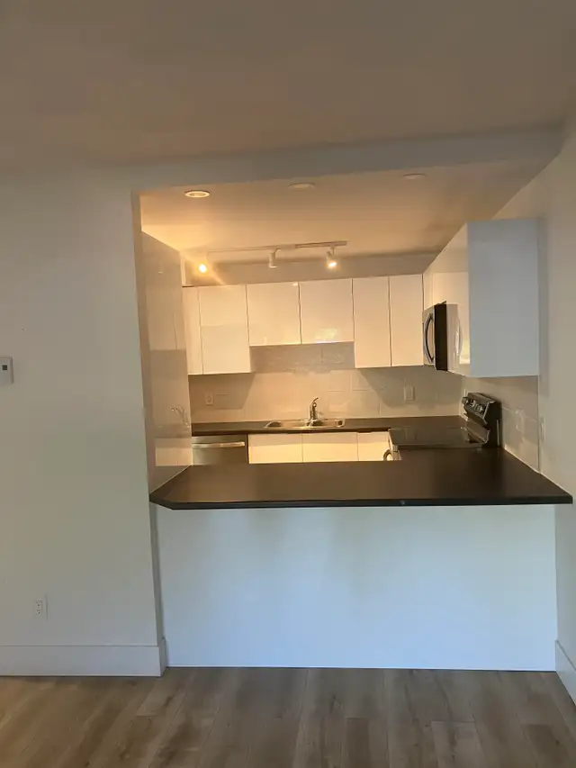 Unique 1 Bedroom with Laundry & Heat Pump  !!