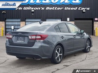 Come see this certified 2021 Subaru Impreza Touring AWD | 5-Speed Manual | Heated Seats | Alloy Whee... (image 4)