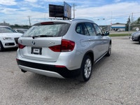 2012 BMW X1 has Clean Carfax, Air Conditioning, Cruise Control, Power Seats, Heated Seats, Sunroof /... (image 5)