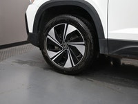 The Taos comes with a 158-hp turbocharged 1.5-liter four-cylinder, its road manners are refined, and... (image 3)