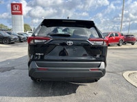 Command the road in this sleek 2023 Toyota RAV4 LE, boasting a Midnight Black Metallic exterior that... (image 5)