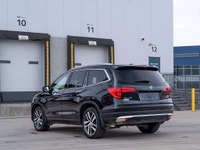 CARGET AUTOMOTIVE is thrilled to offer this 2017 Honda Pilot Touring, a well-equipped midsize SUV of... (image 8)