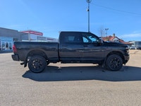 This pre-owned 2026 Ram 2500 Laramie Crew Cab Night Edition combines heavy-duty capability with prem... (image 7)