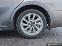 This 2024 Toyota Camry SE comes equipped with a Direct Shift 8-speed automatic transmission with pad... (image 9)