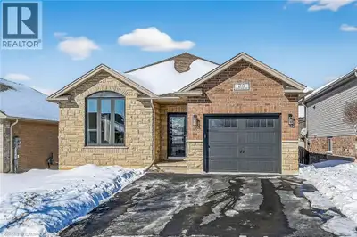 Immaculate bungalow on a quiet street in popular West Brant, built in 2011. This open-concept home f...