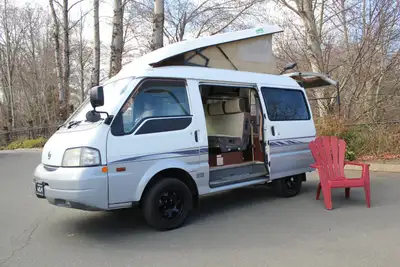 Camper Van Ready for Adventure! Four-by-Four with a higher wheelbase for getting to those remote spo...