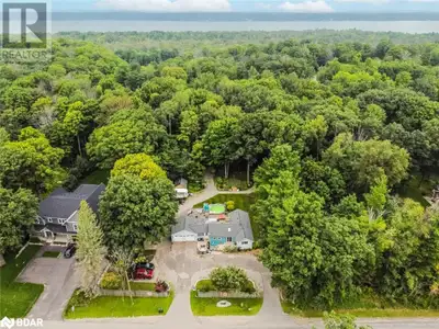ENDLESS POTENTIAL IN A HIGH-GROWTH AREA! This home is nestled on just under an acre of land. Positio...