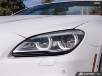Experience the thrill of open-air driving in this stunning 2018 BMW 6 Series 650i xDrive Convertible... (image 5)