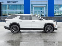 The 2026 Chevrolet Traverse LT AWD stands out in a bold White finish that complements its wide, athl... (image 2)