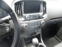 Finished in Desert Sand Metallic with a Black interior, this 2022 GMC Canyon 4wd At4 Cloth brings mi... (image 5)