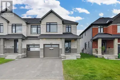 Be the first to call this stunning, never-lived-in Claridge Wentworth end-unit townhome home! Locate...