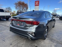 Stay warm and connected in this 2021 Kia Forte EX, finished in a sleek Steel Grey and showing 160554... (image 4)
