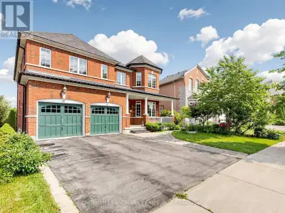 Welcome to this extraordinary five-bedroom home located in a highly desirable Aurora community, boas...