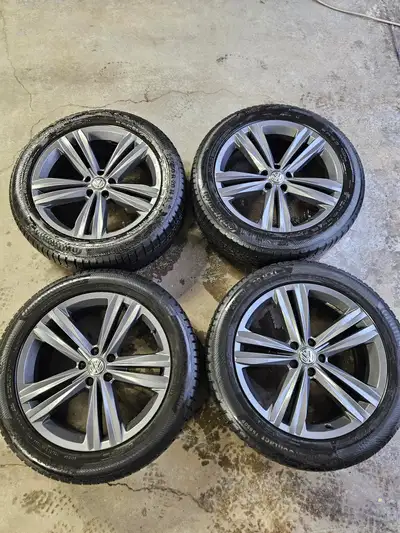 Mint set of original VW Atlas wheels mounted on Continental winter tires. Wheels: 20x8 Offset: 34 Bo...