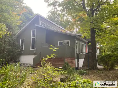 Maison unifamilliale de trois chambres dont l'une située au Rez-de-jardin pouvant être utilisée comm...