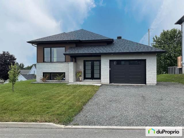 $664,000 - Bi-Level for sale in Beaumont — photo 1
