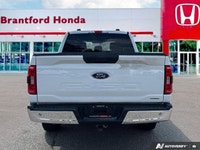 Unleash the power and capability of this 2022 Ford F-150 Crew Cab Pickup. This robust truck boasts a... (image 4)