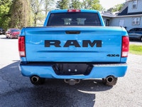 The 2021 Ram 1500 Classic Express 4x4 Crew Cab 57 Box is ready to tackle any road with its striking... (image 3)