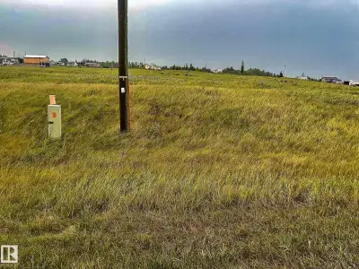 Experience the perfect backdrop for your dream home or getaway on this expansive 1.24-acre lot, feat...