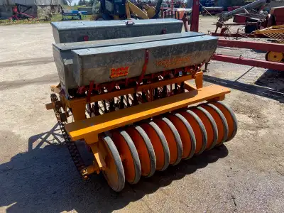Welcome to Stoneage Equipment Minneapolis-Moline 10 run seed drill with grass, fertilizer. Has press...
