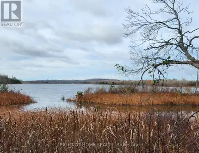 OVER 1 ACRE! Affordable waterfront lot on Pigeon River in the Village of Omemee. Nestled away from t...