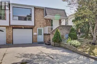 Welcome to Your Ideal Investment & Starter Home!! Discover this beautifully updated raised semi-bung...