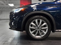 The 2021 INFINITI QX50 LUXE is a compelling compact luxury SUV that balances distinctive styling wit... (image 9)