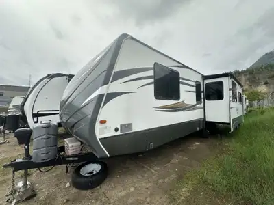 Welcome to Rock Island RV Full Winter Package. 2 slides, solid surface countertops, slide toppers, e...