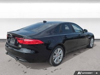 This 2016 Jaguar XF Prestige is powered by a refined 3.0L supercharged V6 engine paired with a smoot... (image 4)