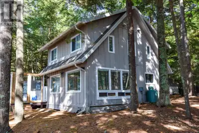 This is the lakeside retreat you've been waiting for! Tucked away on the highly sought after Canoe I...