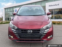 Designed for efficiency and confident urban navigation, this vibrant red 2024 Nissan Versa SV, is yo... (image 6)