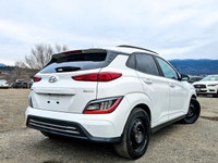 Welcome to a new era of driving with the 2023 Hyundai Kona Electric Ultimate in a pristine white fin... (image 1)