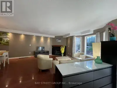 Discover this Rare End-Unit Townhouse Backing onto a Wooded Trail in the Heart of Clearview! Enjoy a...
