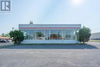 7,035 sq ft former car dealership for lease @ $15.00 per sq ft Net to the Landlord. Operating costs...