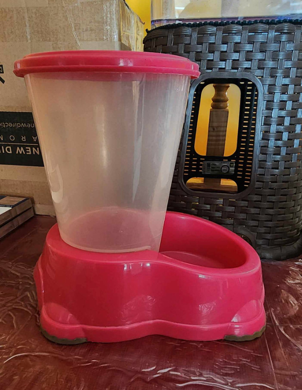Large Gravity Food Feeder, 11" tall, 10" long, top is rubbery ea in Accessories in Pembroke