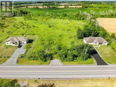 Discover the perfect setting for your future home on this beautiful 4.88-acre vacant lot, ideally lo...