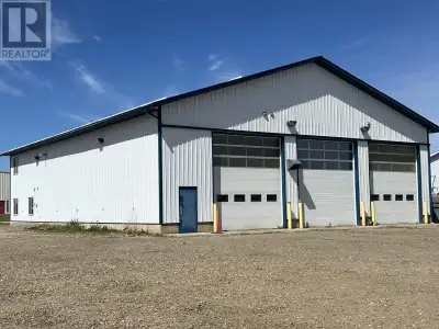 Excellent well-maintained 60'x80' shop with 3- 14'x 15'6 overhead doors. Concrete grade beam foundat...