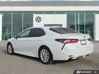 Drive with confidence and impressive efficiency in this 2021 Toyota Camry SE, a dependable 4-door se... (image 2)