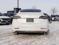 Experience the epitome of modern driving with the 2023 Tesla Model 3 Long Range AWD in a stunning Wh... (image 3)