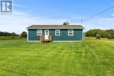 Charming 2-Bedroom Bungalow with Heated Detached Garage & Stunning South Shore Views! This charming...