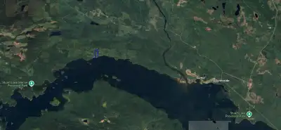 WATERFRONT LOT - START YOUR SUMMER ON STUART LAKE. Discover 1.07 acres of pristine, remote, treed pr...