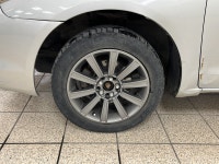 Silver light glances off the Titanium Metallic paint as it moves, the compact hatchback shape cuttin... (image 8)