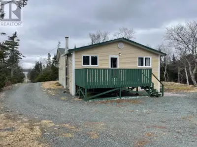 Escape to your own private retreat with this lovely open-concept, 3-bedroom, 1-bathroom cabin nestle...