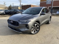 **WE WILL BEAT ANY DEALER IN THE CITY** Carbonized Gray Metallic 2024 Ford Escape Platinum AWD 8-Spe... (image 1)