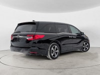 This 2020 Honda Odyssey EX-L finished in a sleek black exterior with a matching black leather interi... (image 4)