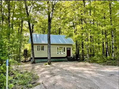 *sleek and modern open concept kitchen/living * 2 Bedrooms, 1 bath (3 pc with compost toilet) *Ciste...