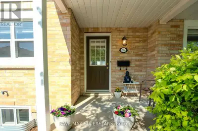 Prime Exhibition Park Townhome A Must-See! Bright, open-concept main floor with a fully updated kitc...