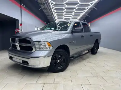 The 2023 Ram 1500 Classic SLT, with its stunning silver finish and robust 44 drivetrain, effortlessl...